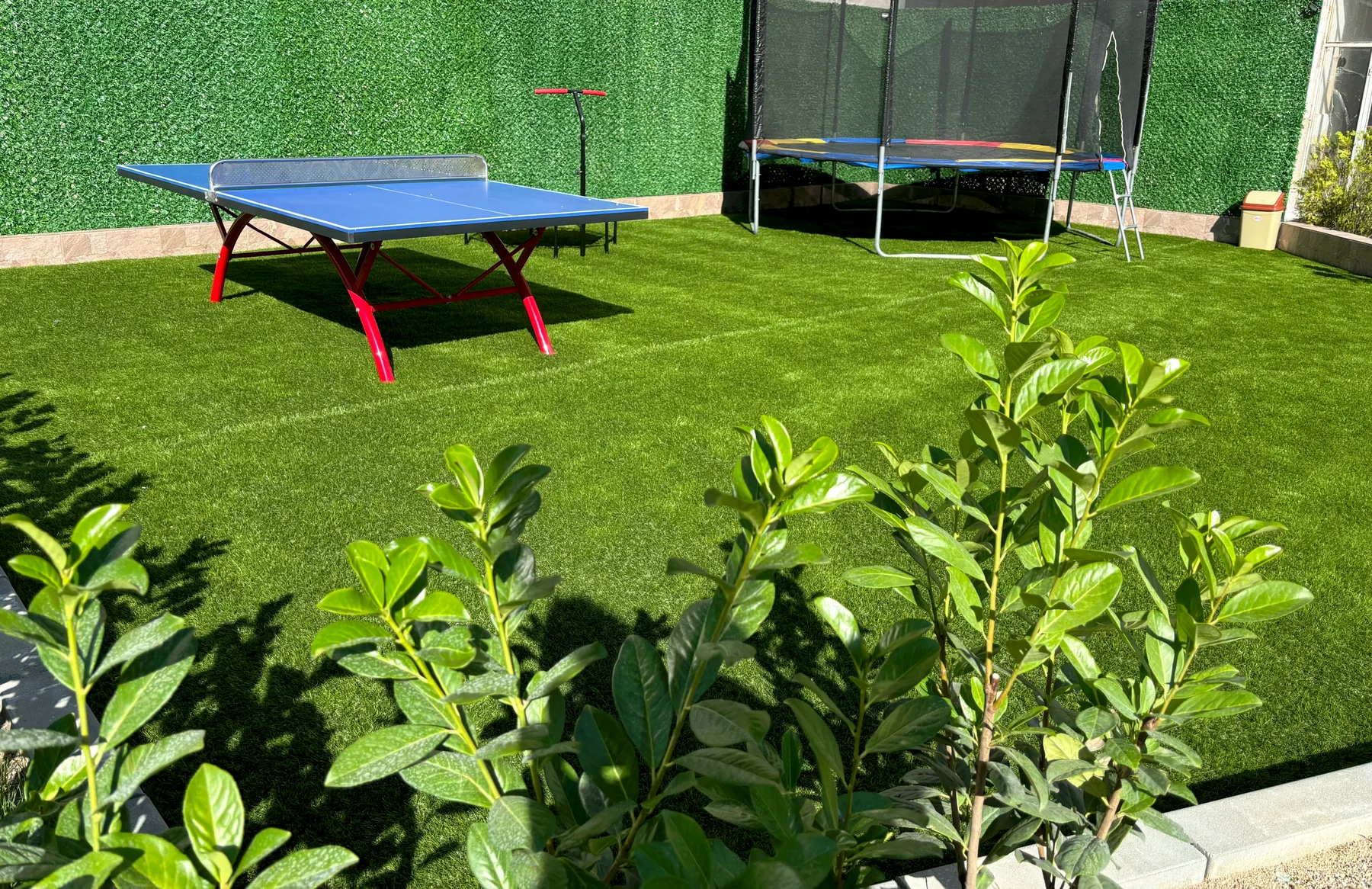 Children’s area with table tennis and trampoline